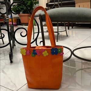 EGO Orange Tote with Colorful Floral Accents